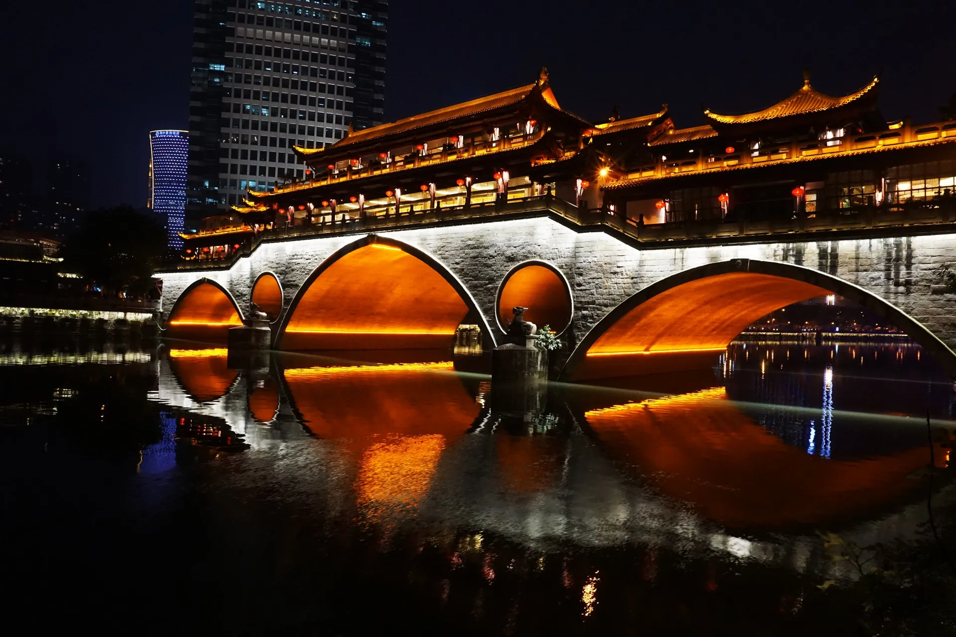 Anshun Bridge lit up at night over the Jin River in Chengdu