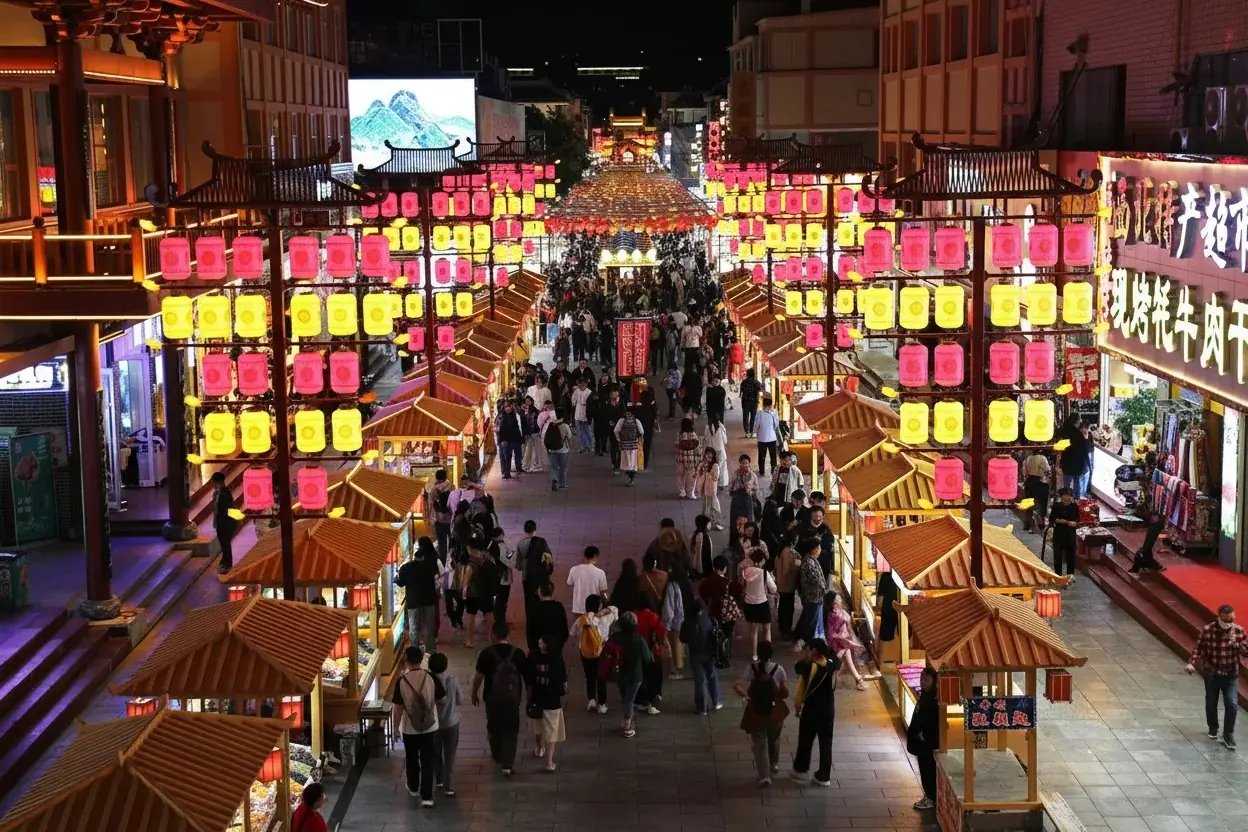 Lanterns, crowds and food stalls at Dunhuang's Shazhou night market