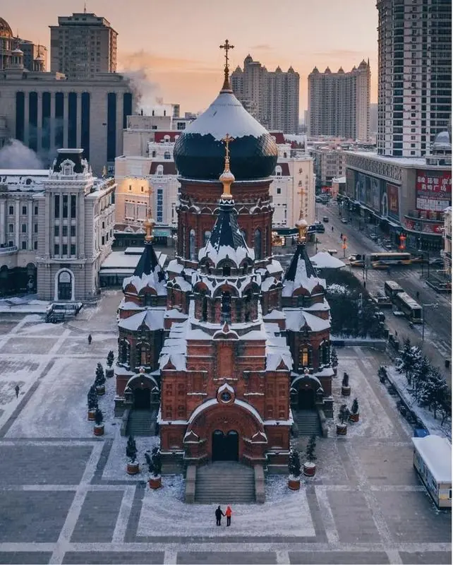 Saint Sophia Cathedral in Harbin under snow, seen from above its square
