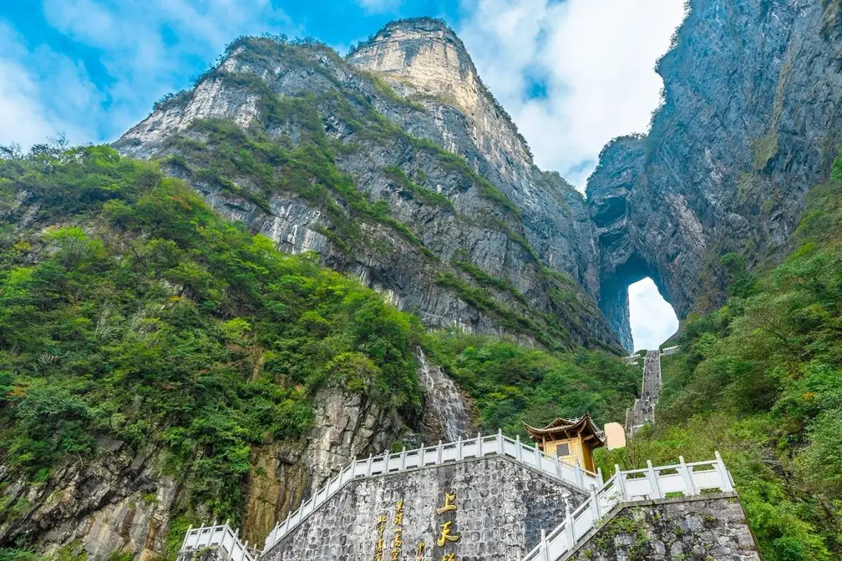 Tianmen Cave, the natural arch through Tianmen Mountain in Zhangjiajie, seen from the stairway below