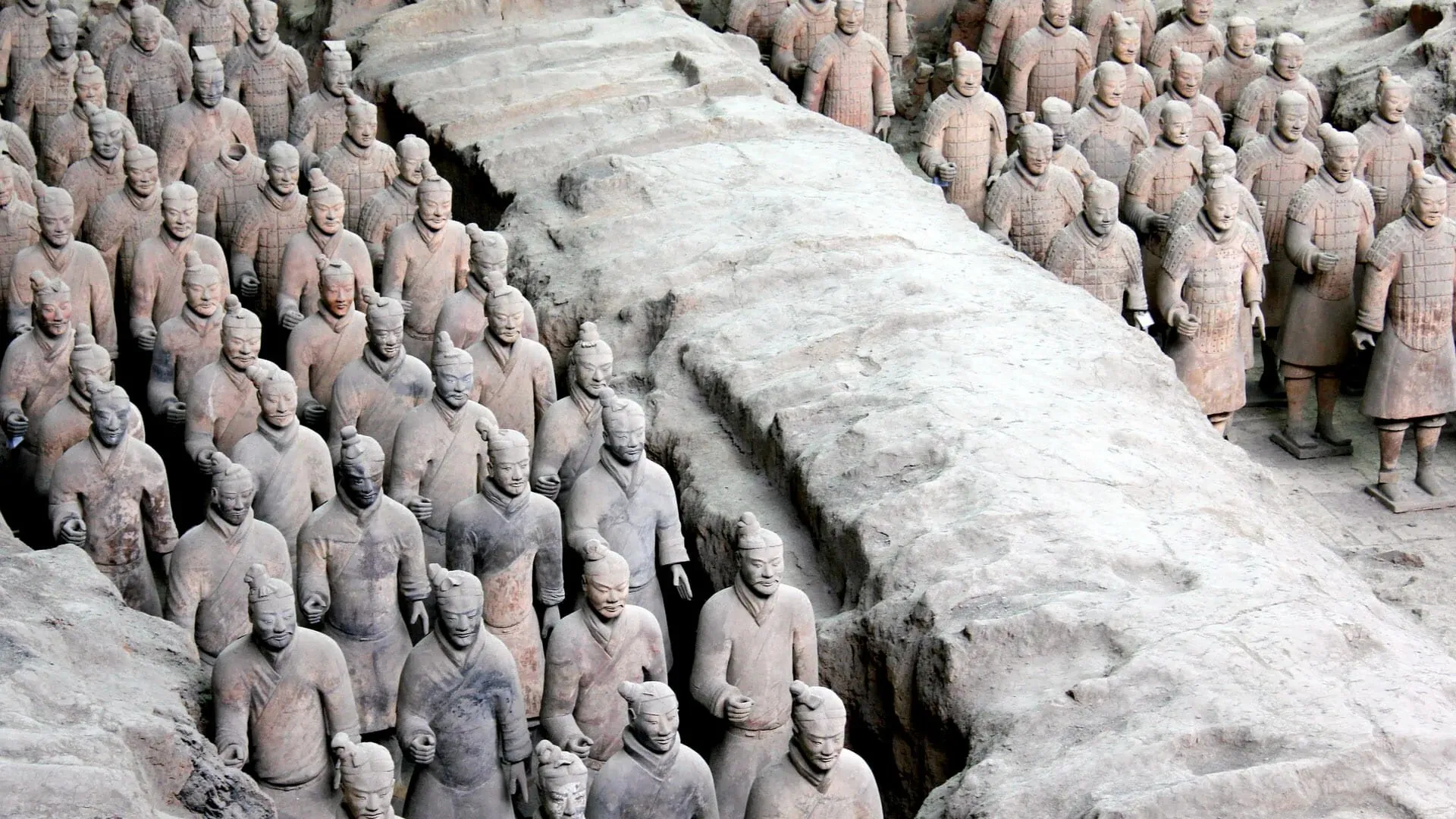 Rows of Terracotta Warriors standing in the excavation pit in Xi'an